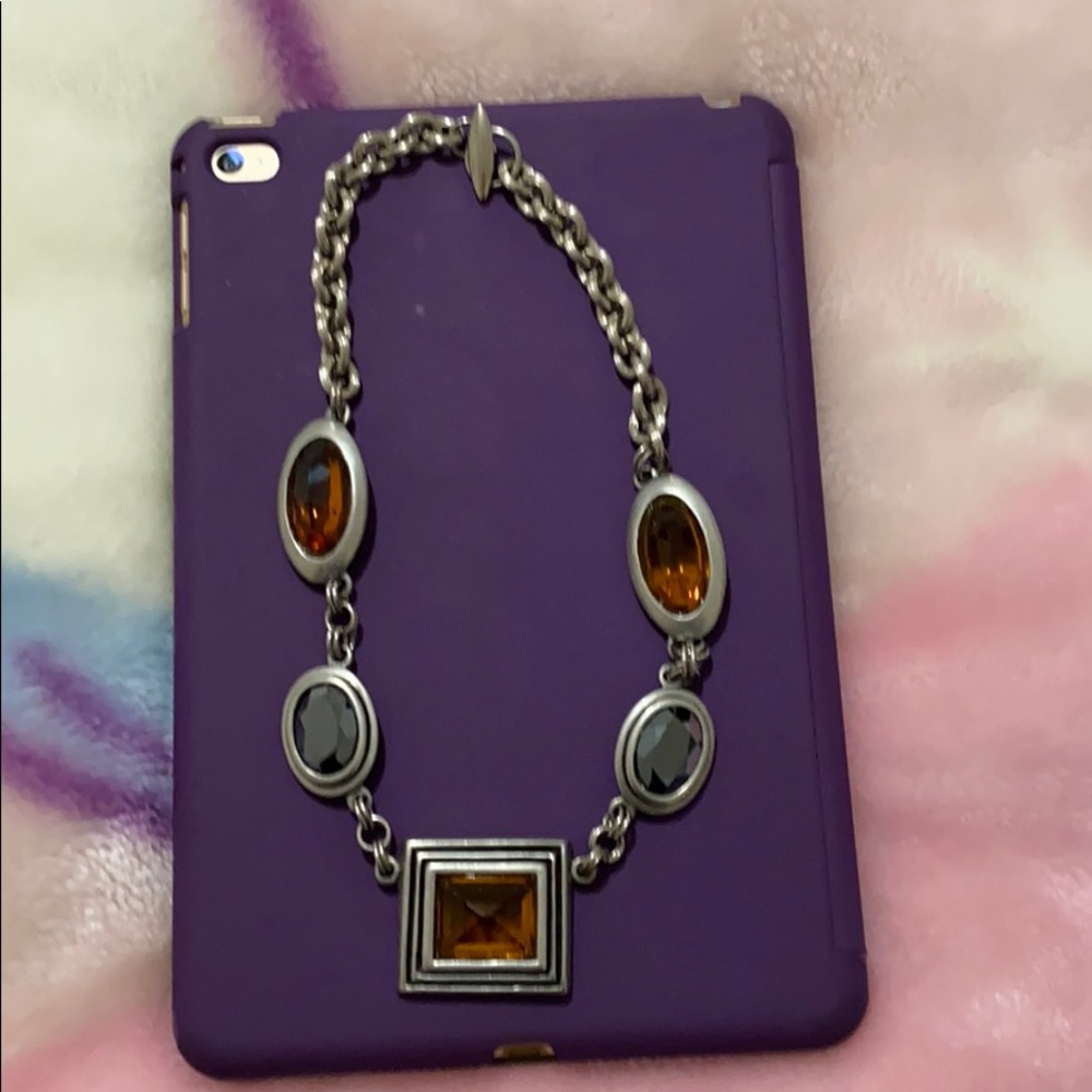 Statement necklace bought it from Neiman Marcus